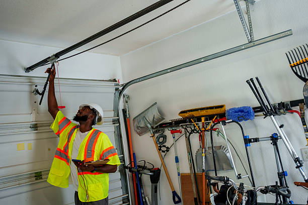 Professional Garage Door Spring Repair technician working in Rose Hill, KS